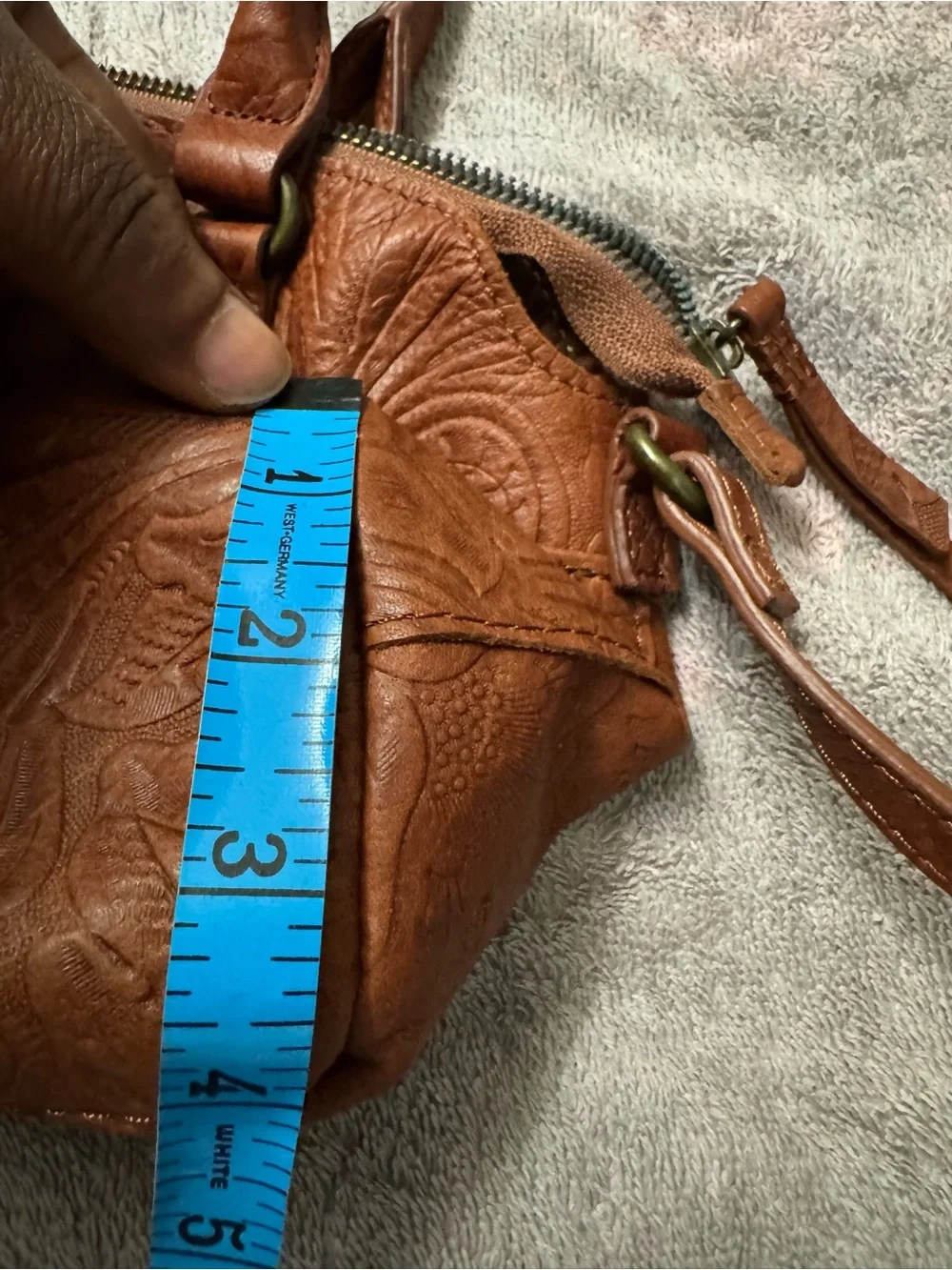 American Leather Co. compact embossed